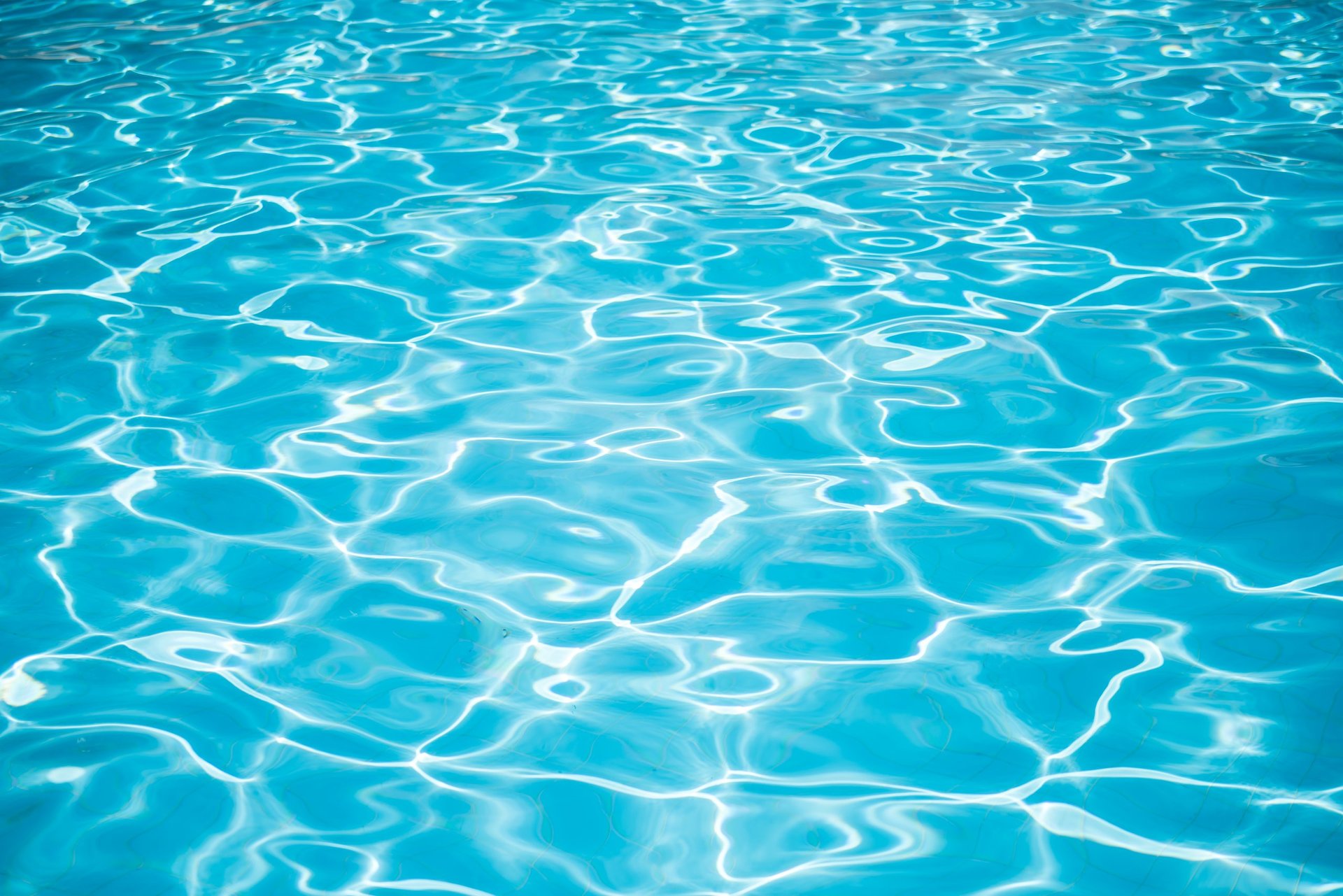 Blue swimming pool surface background